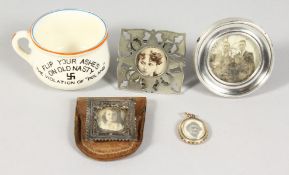 FOUR SMALL PHOTOGRAPH FRAMES AND A NOVELTY HITLER CUP