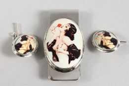A SILVER AND ENAMEL MONEY CLIP and PAIR OF CUFFLINKS.