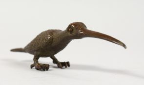 A JAPANESE BRONZE MODEL OF A BIRD. 5.5ins long.