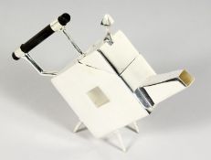 A CHRISTOPHER DRESSER STYLE DIAMOND TEAPOT.