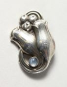 A GEORG JENSEN SILVER BROOCH.