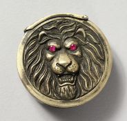 A BRASS LION VESTA.