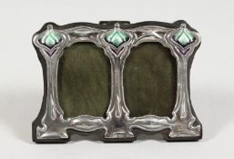 A SMALL ART NOUVEAU STYLE SILVER AND ENAMEL DOUBLE PHOTOGRAPH FRAME. 4.5ins x 3ins.