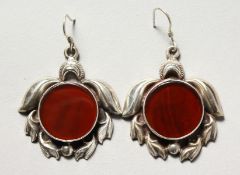 A PAIR OF SILVER AND CARNELIAN EARRINGS.