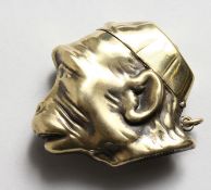 A BRASS MONKEY VESTA.