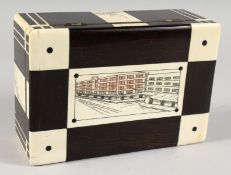 A 1920'S ITALIAN COROMANDEL AND IVORY CASKET, inset will panels of buildings. 7ins long.