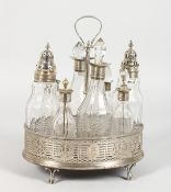 A GEORGE III OVAL PIERCED EIGHT BOTTLE CRUET. London 1779.