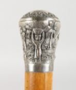 A MALACCA CANE with silver handle. 35ins long.
