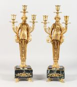 A PAIR OF EMPIRE REVIVAL GILT BRONZE AND MARBLE FIGURAL CANDELABRA. 17ins high.