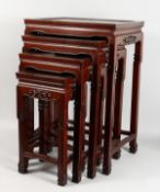 A CHINESE HARDWOOD NEST OF FOUR TABLES. Largest: 19ins wide x 27ins high.