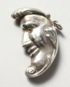 A SILVER MOON VESTA.