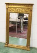 A MODERN GILT FRAMED PIER MIRROR IN THE REGENCY STYLE.