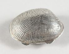 A SILVER CLAM PILL BOX.