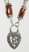 A SCOTTISH SILVER TOGGLE BRACELET with Queen Victoria clasp.