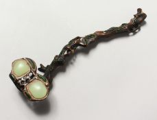 A CHINESE BRONZE AND JADE RUI SCEPTRE. 10.5ins long.