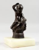 A GOOD SMALL BRONZE OF A PUTTI RIDING A TORTOISE. 4ins high, on a square onyx base.