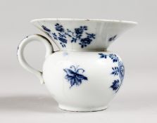 AN 18TH CENTURY MEISSEN BLUE AND WHITE SPITTOON. Cross swords mark in blue. 3.5ins high.