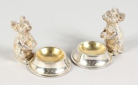 A GOOD PAIR OF SILVER PLATE MICE SALTS.