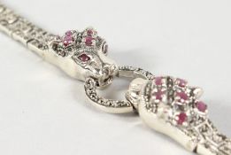 A SILVER RUBY SET PANTHER BRACELET.
