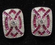 A PAIR OF SILVER FAUX RUBY DECO STYLE EARRINGS.