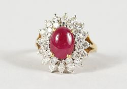 AN 18CT GOLD, RUBY AND DIAMOND DRESS RING.