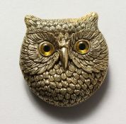 A BRASS OWL VESTA.