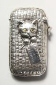 A SILVER NOVELTY CAT IN A BASKET VESTA.