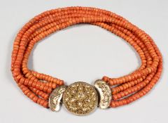 A FIVE-ROW CORAL BEAD NECKLACE with 18ct gold clasp.