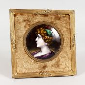 A GOOD LIMOGES CIRCULAR ENAMEL PORTRAIT OF A LADY. 3ins diameter, in a gilt frame.