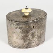 A VICTORIAN OVAL SILVER TEA CADDY, with engraved decoration. London 1857. Maker: JA. 3.5ins high.