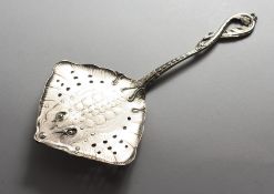 A CONTINENTAL .830 SILVER SKATE FISH LADLE.