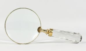 A LADIES MAGNIFYING GLASS with cut glass handle.