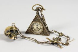 A BRASS MASONIC SKULL WATCH.