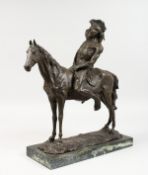 A BRONZE MODEL OF A NATIVE AMERICAN INDIAN ON HORSEBACK, on a marble base. 18ins high.