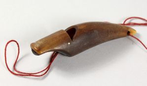 A RHINO WHISTLE. 3.5ins long.