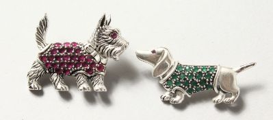 TWO SILVER GEM SET DOG BROOCHES.