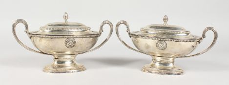 A GOOD PAIR OF GEORGE III ADAM DESIGN TWO-HANDLED OVAL TUREENS AND COVERS, beaded edge and reeded