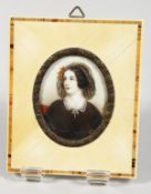 A GOOD SMALL MINIATURE OF A LADY. 2ins x 1.5ins, in an ivory frame.