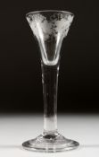 A GEORGIAN WINE GLASS with tapering bowl engraved with fruiting vines, plain stem. 6.5ins high.