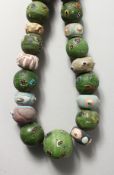 A VERY GOOD SET OF GREEN ROMAN BEADS.