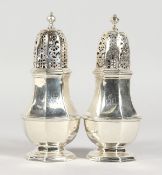 A GOOD PAIR OF GEORGE I OCTAGONAL CASTLES, 5ins high, crested. London 1719. Maker: Samuel Welder.