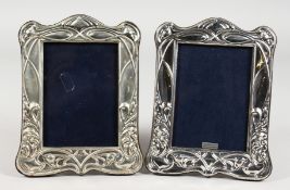 A PAIR OF ART NOUVEAU STYLE PHOTOGRAPH FRAMES. 8ins x 6.25ins.