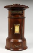A GOOD CIRCULAR MAHOGANY LETTER BOX, with letter box and door. 15ins high.