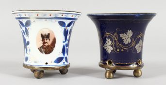 A RUSSIAN BLUE AND WHITE ENAMEL JARDINIERE, on three ball feet, 3ins high, and another with fruiting