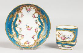 A 19TH CENTURY PARIS PORCELAIN SEVRES STYLE COFFEE CUP AND SAUCER, with swags of roses and a dark