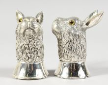 A PAIR OF .925 SILVER RABBIT SALT AND PEPPER.