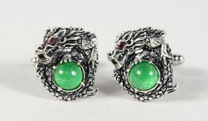 A PAIR OF SILVER AND JADE DRAGON CUFFLINKS.