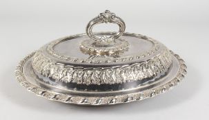 A GOOD IRISH OVAL ENTREE DISH, COVER AND HANDLE. WEST & SON, DUBLIN.