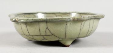 A CHINESE CRACKLE GLAZE CELADON BRUSH WASHER. 6ins diameter.