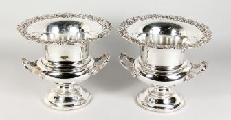 A GOOD PAIR OF WALKER & HALL TWO-HANDLED CHAMPAGNE BUCKETS, with fruiting vine decoration. 10ins